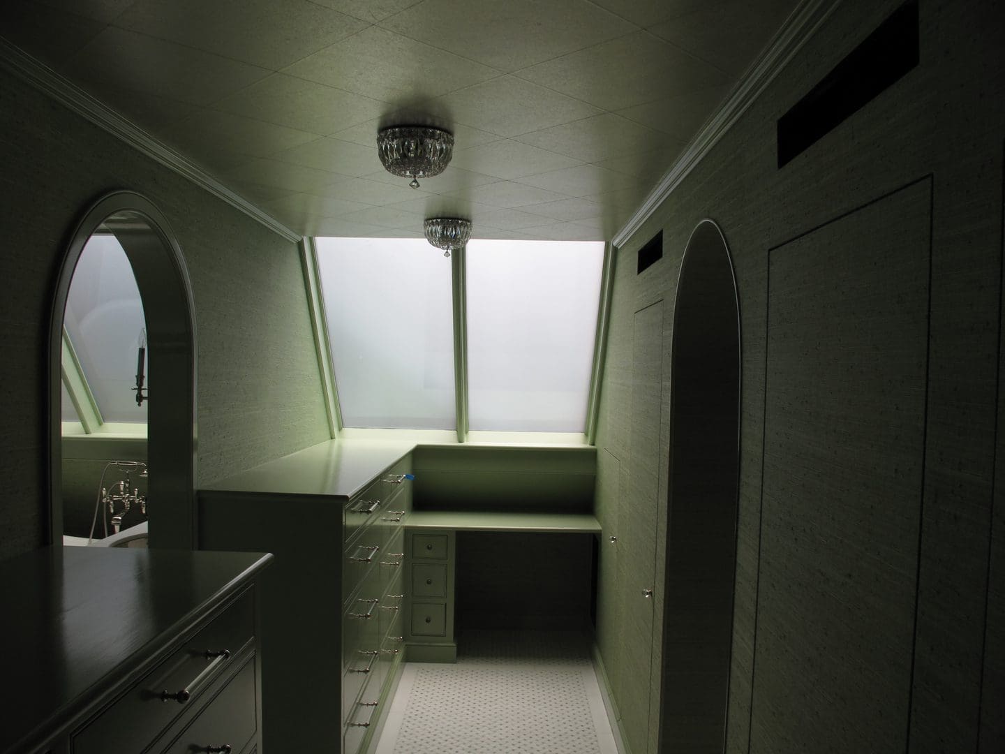 A room with a window and a sink