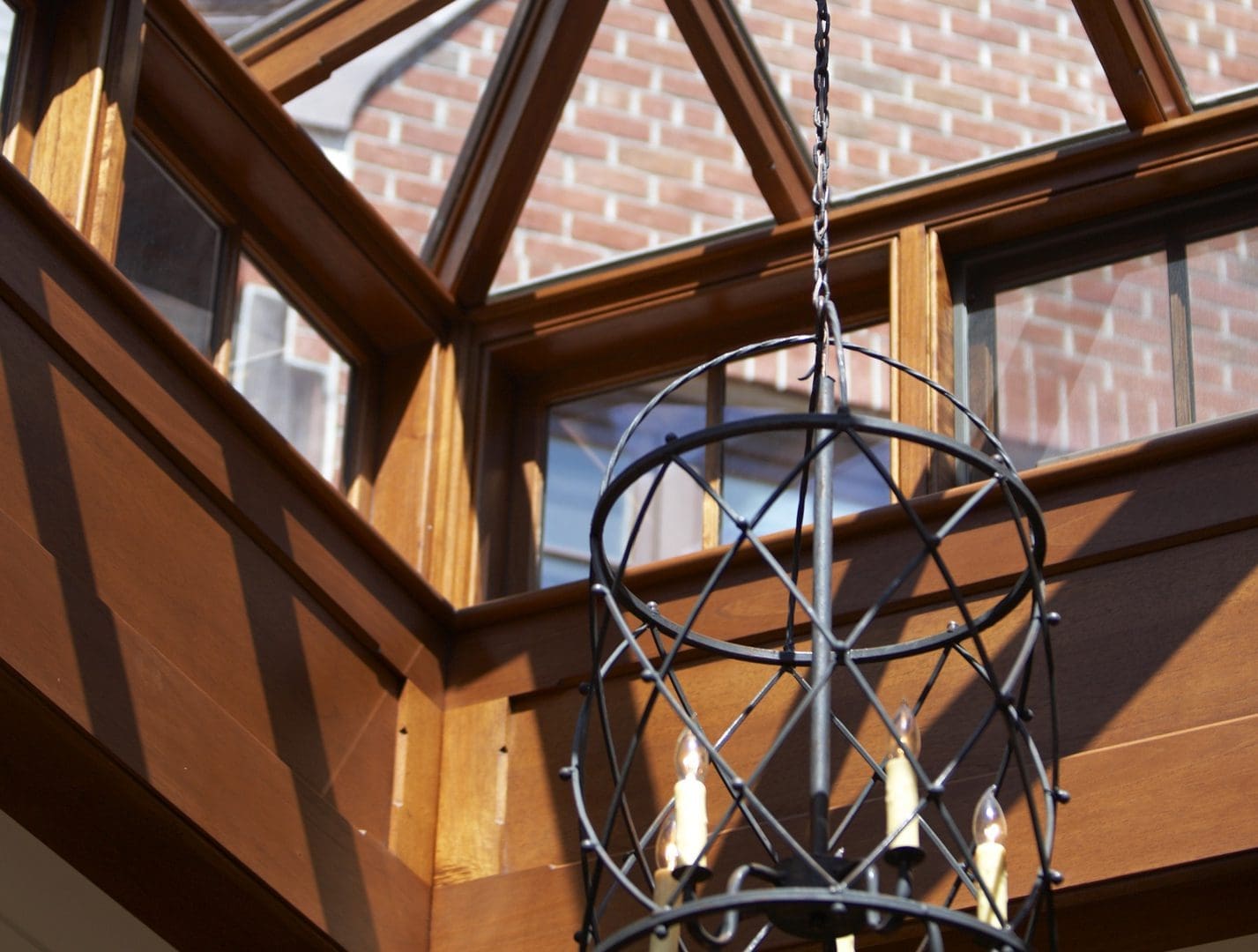 A chandelier hanging from the ceiling of a room.
