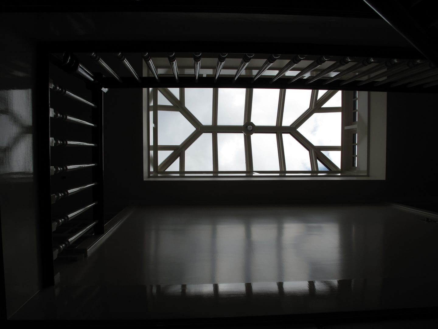 A door way with a window in the middle of it