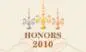 A group of crosses hanging from chains with the word " honors 2 0 1 0 ".