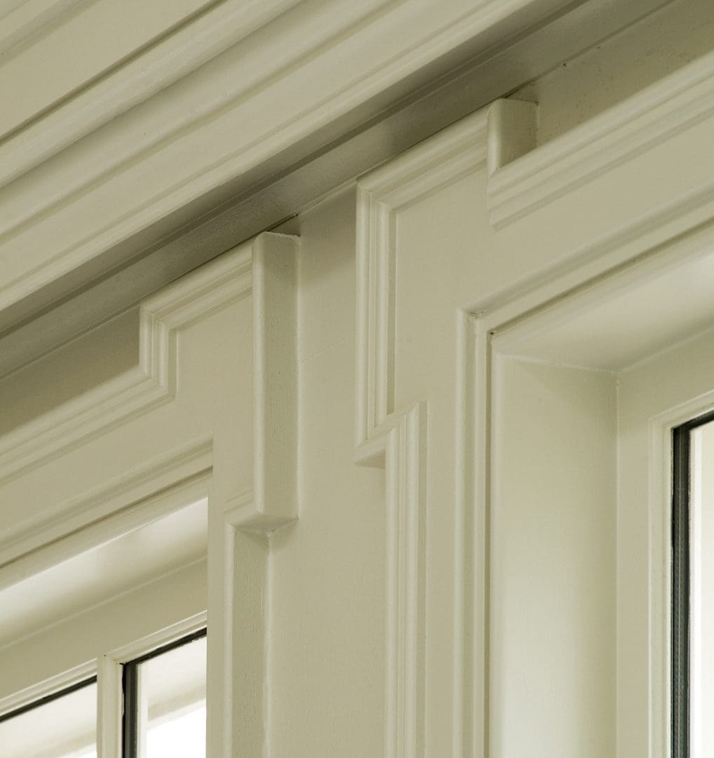 A close up of the window casing on a house