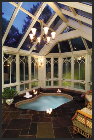 A large indoor hot tub in the middle of a room.