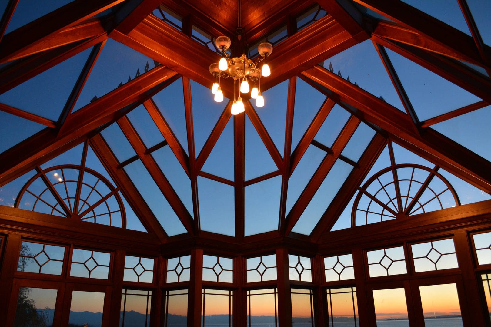 A ceiling with lights and windows in the center.