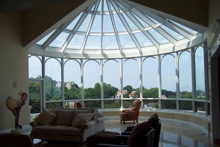 A room with a large glass dome ceiling.