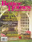 A magazine cover with a window and trellis.